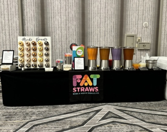 Fat Straws full-service catering setup with boba dispensers and mochi donuts